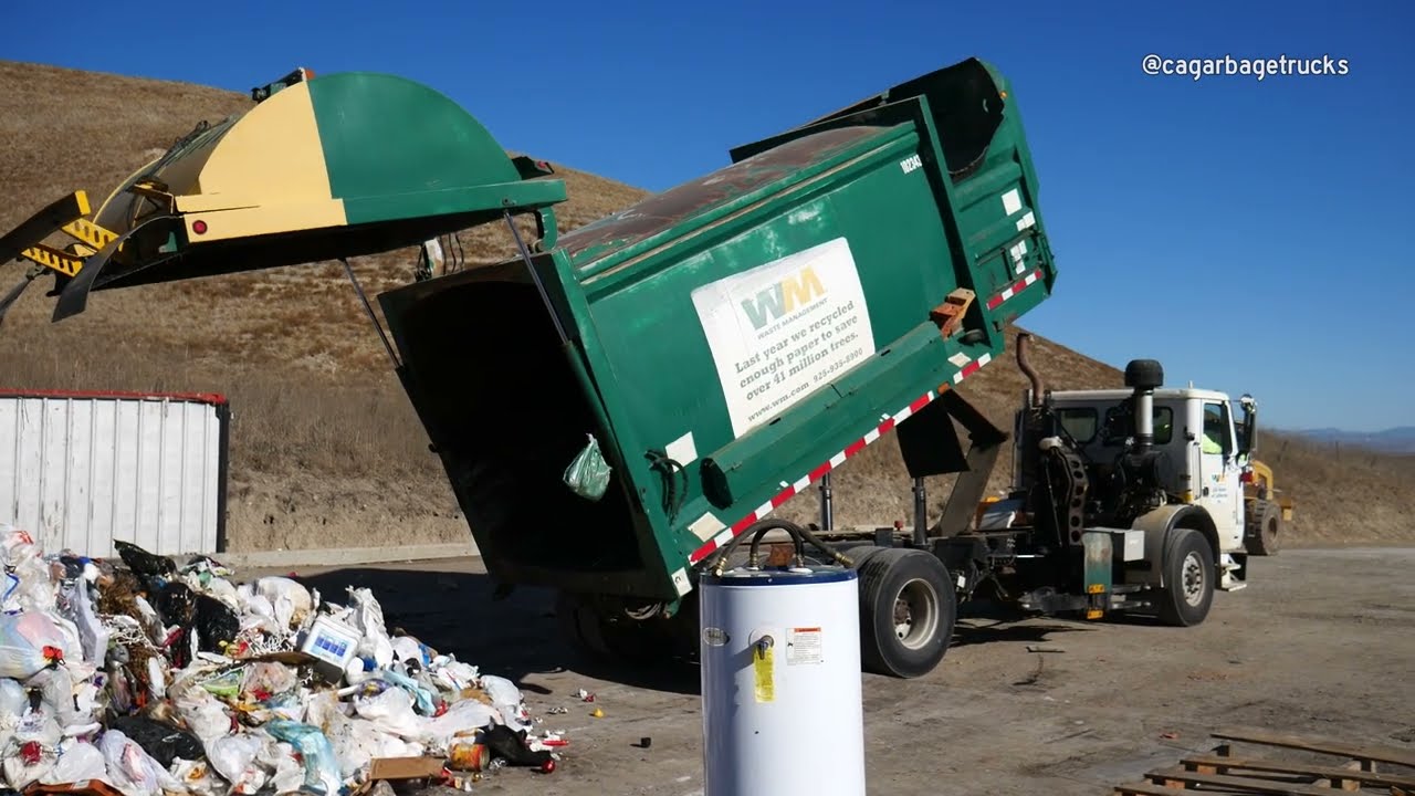 Garbage Trucks Unloading at the Dump