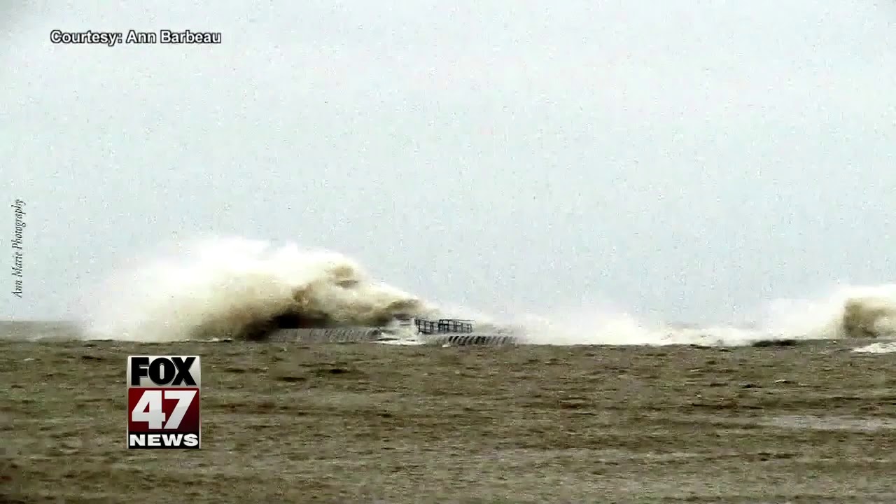 PHOTOS: Massive wave knocks over Lake Michigan lighthouse