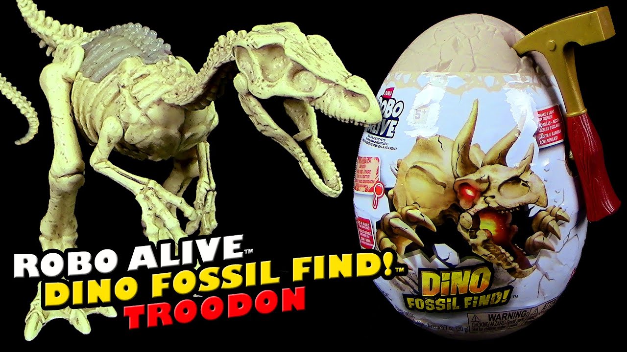 Zuru ® Robo Alive ™ Dino Fossil Find Egg / fossiles Ei mit Troodon Skelett & Licht