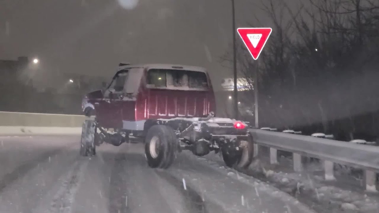 VIDEO NOW: Truck battles slick road conditions on I-195 West