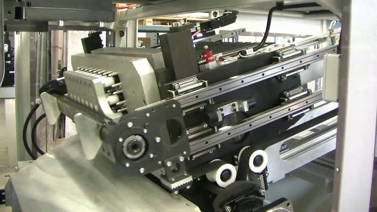 Coffee Capsule - In mould tilting platen FT 500 - Stacker RS7 ø 46,8 PP