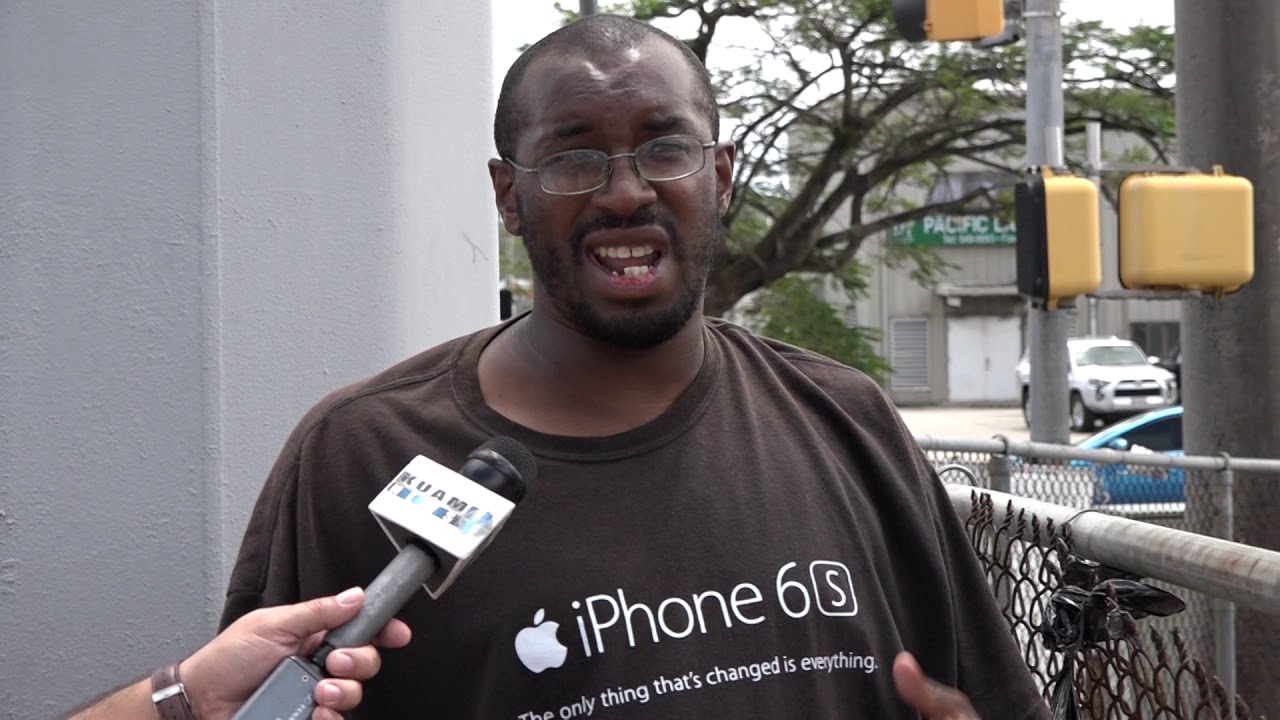 Chris Barnett talks to Henry, a homeless man living on Guam's streets