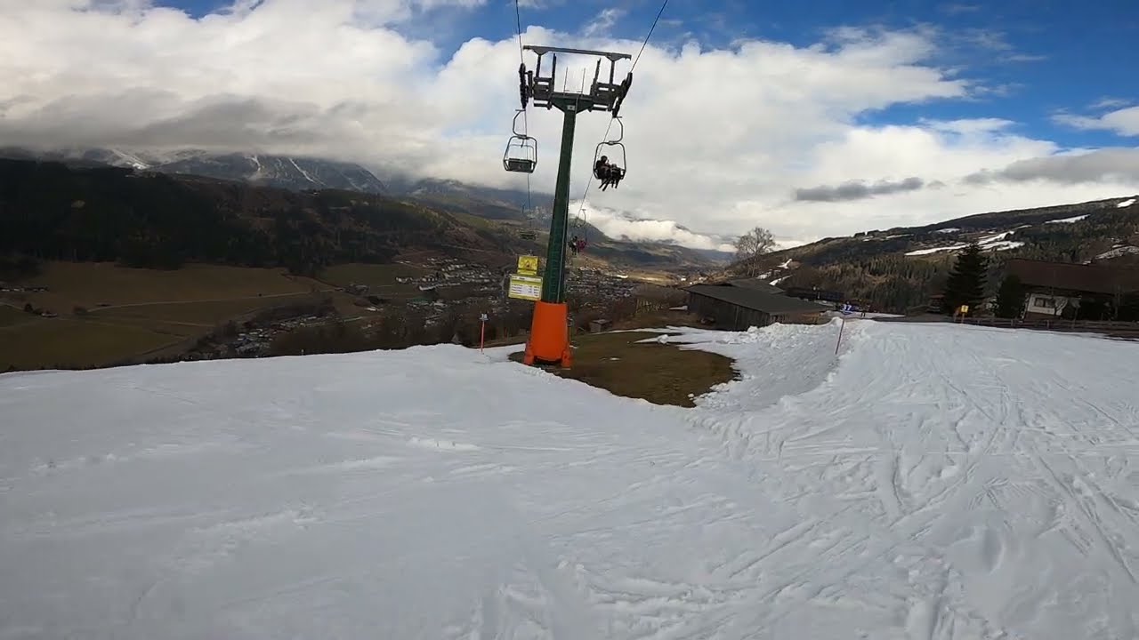 Skiing trough village to Schladming on Blue 37 & 38