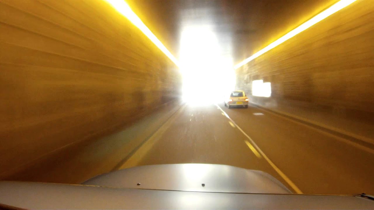 JD Customs BMW M5 in tunnel with Ferrari's