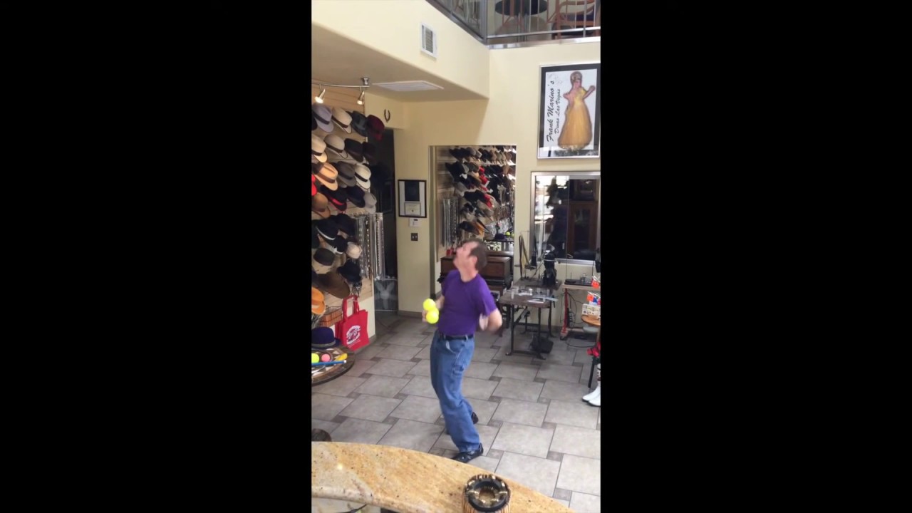 Charlie Frye, Juggler Extrodinaire, tries out his new D Bar J Hat