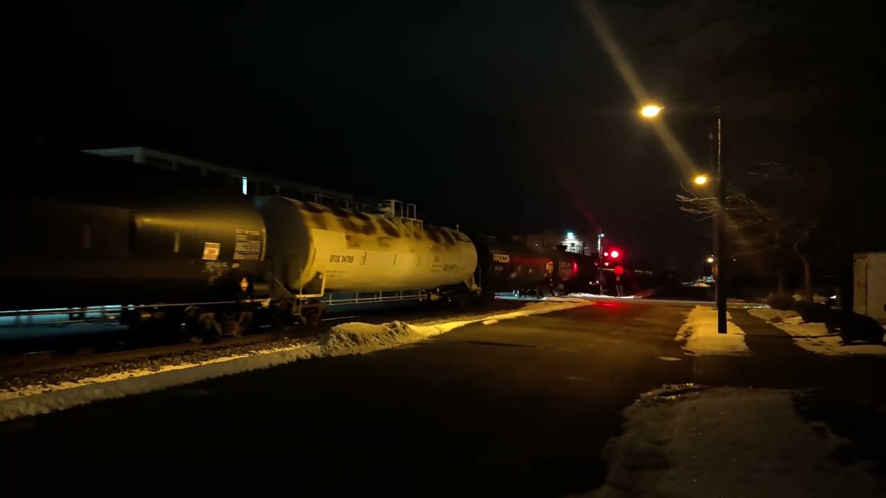 A SD40-2, Chuck and a SD60M hauling an OC manifest train.