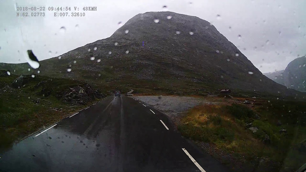Nice norwegian roads in the rain of the car camera