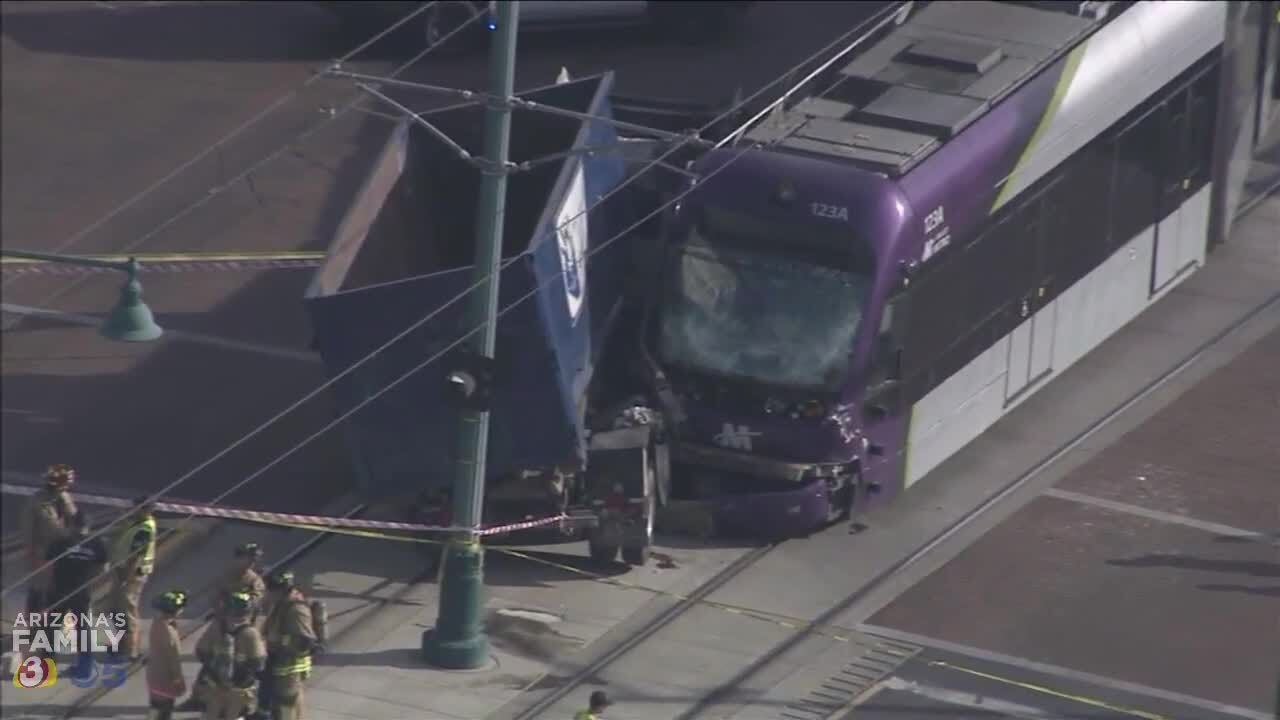 Raw Video: Garbage truck slams into light rail train in Mesa