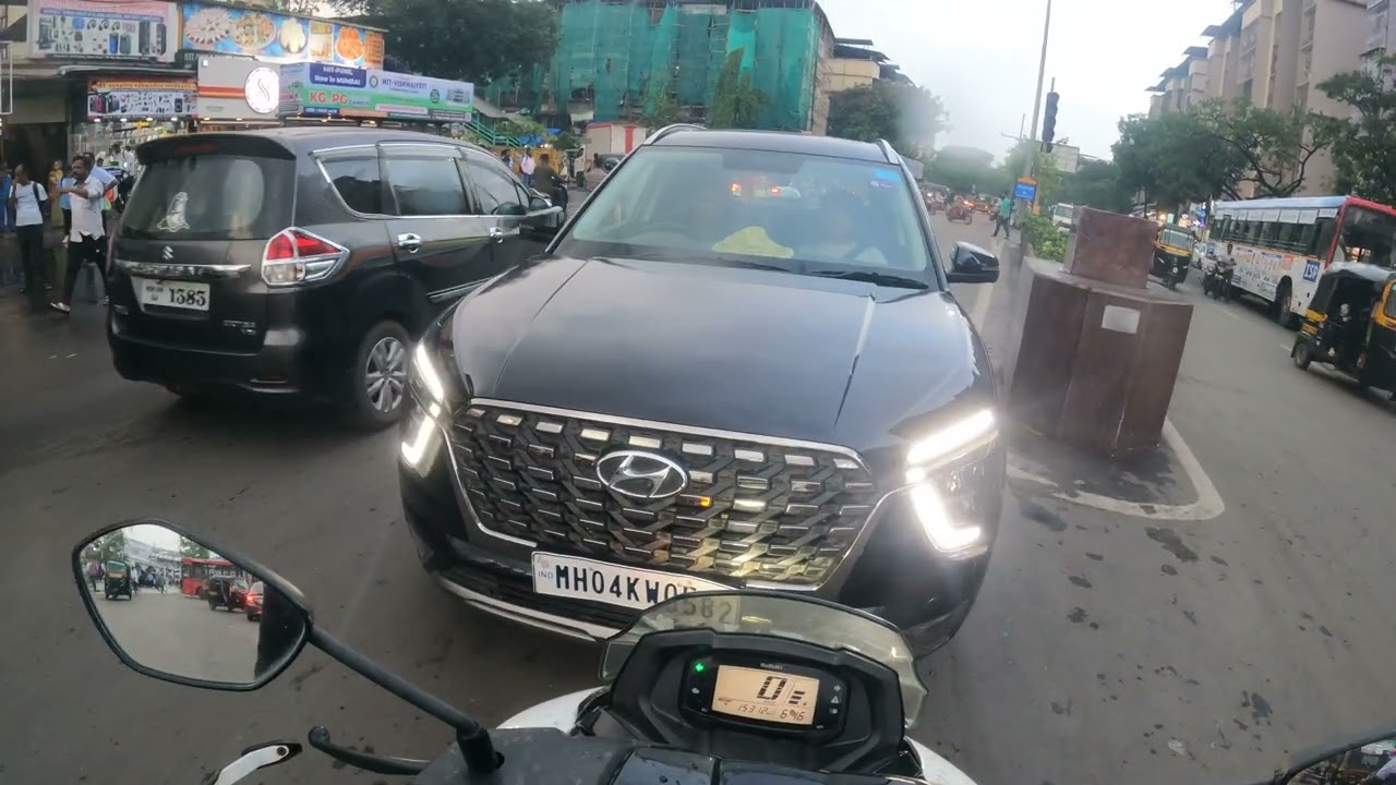 Idiot car driver taking wrong way, traffic police do nothing. 