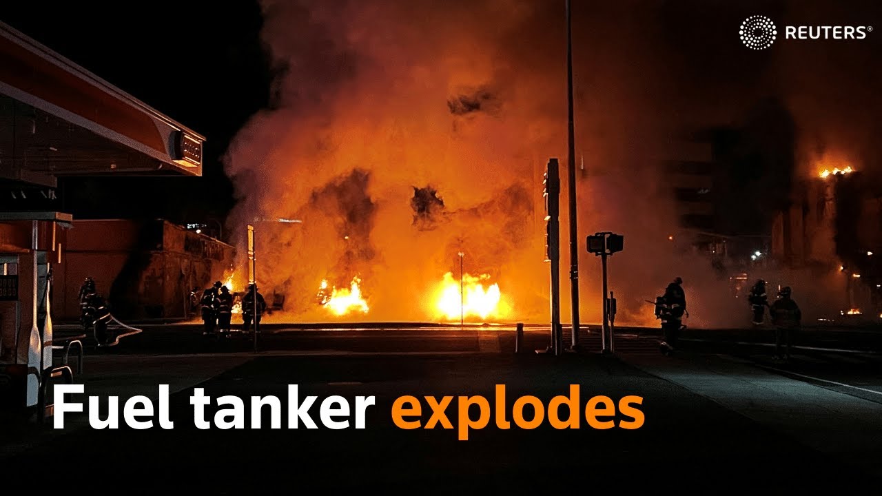Fuel tanker explodes after crashing into a building