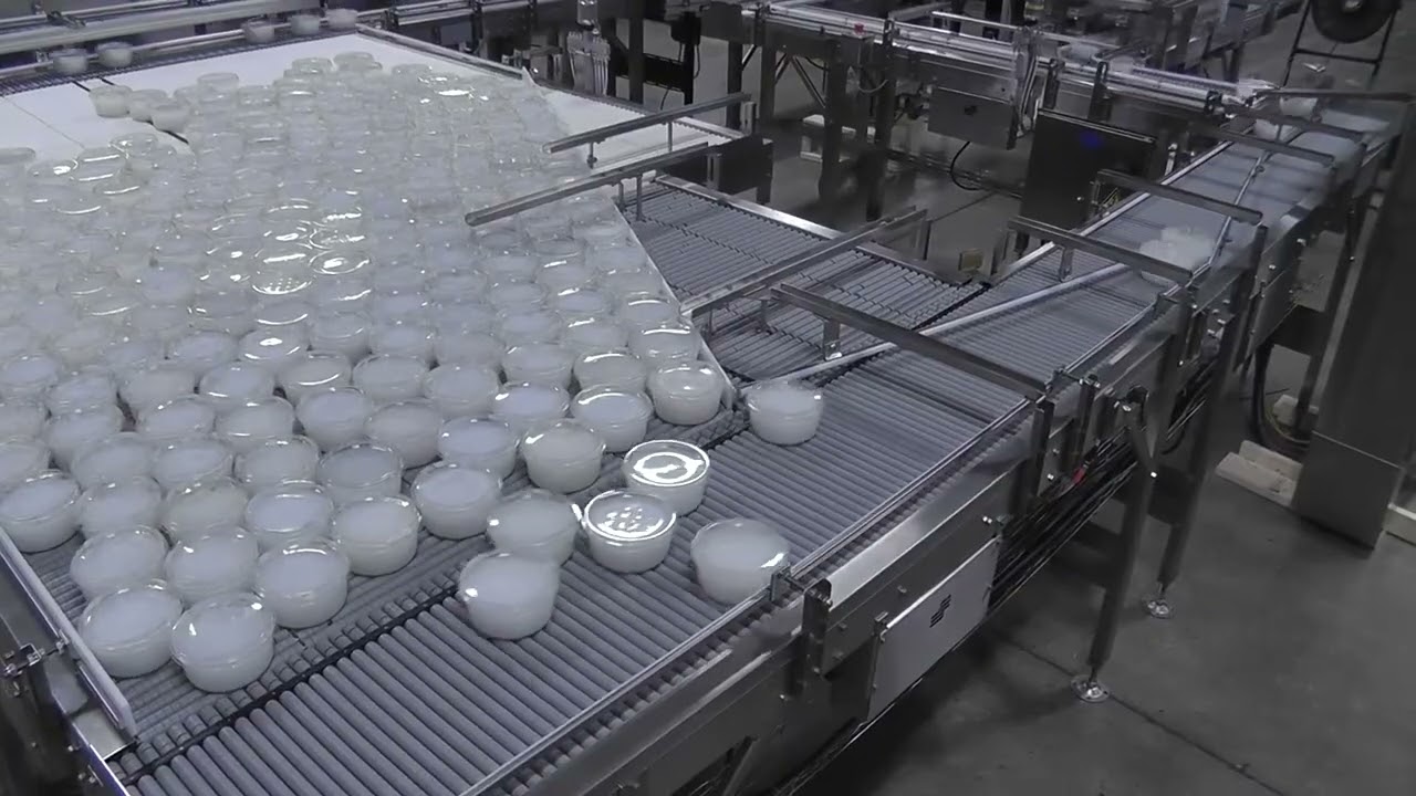 Shuttleworth Accumulating and Dividing Containers of Cheese | ProPac.com