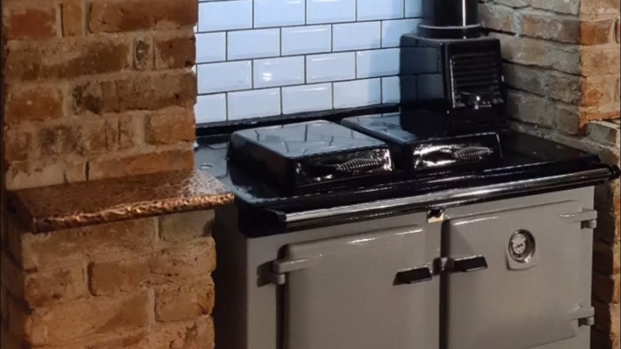 Rayburn Supreme 355 Solid Fuel. Reclaimed brick slips. Lime mortar. DIY.