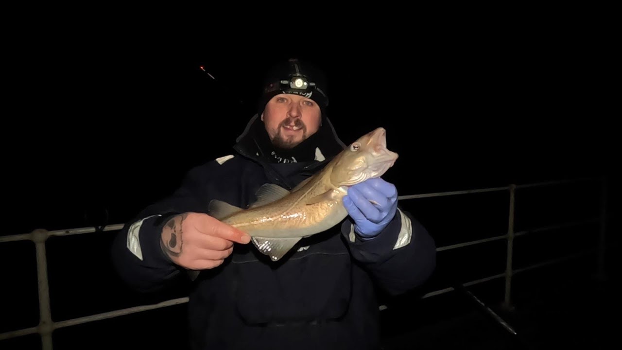 Fishing For Winter Cod On Whitby East Pier