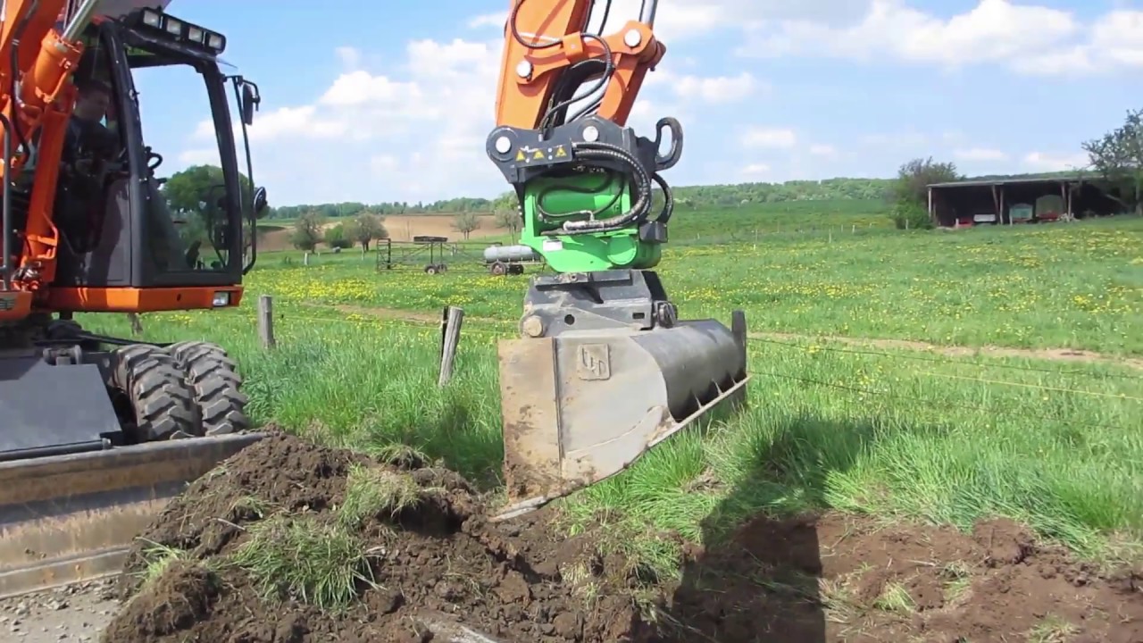 Böschungsarbeiten mit dem HKS TiltRotator / Doosan DX160W / Oilquick