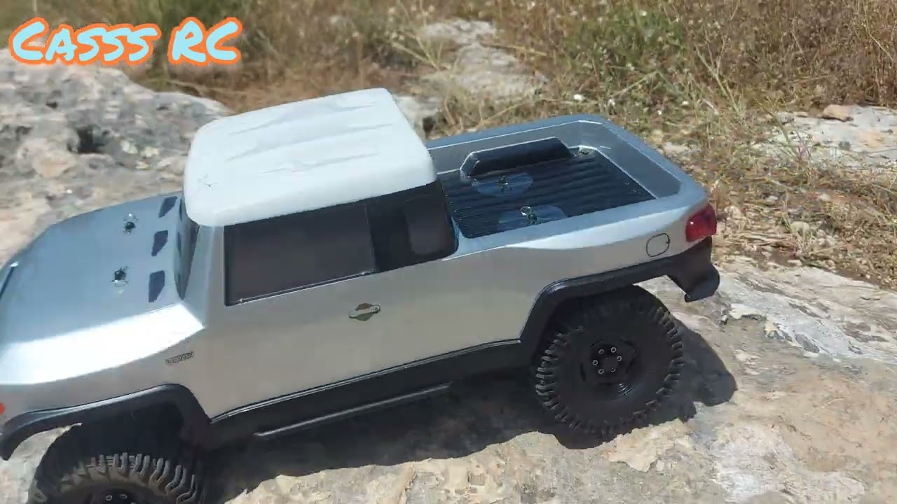 פתיחת קופסה של 2 מכוניות שלט זחלנים של אלמנט
