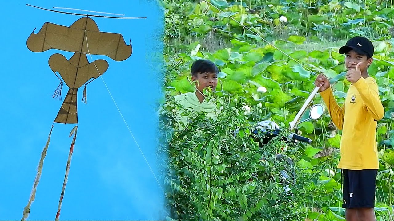 Smart boys made big sound kite to fly high looking interesting.