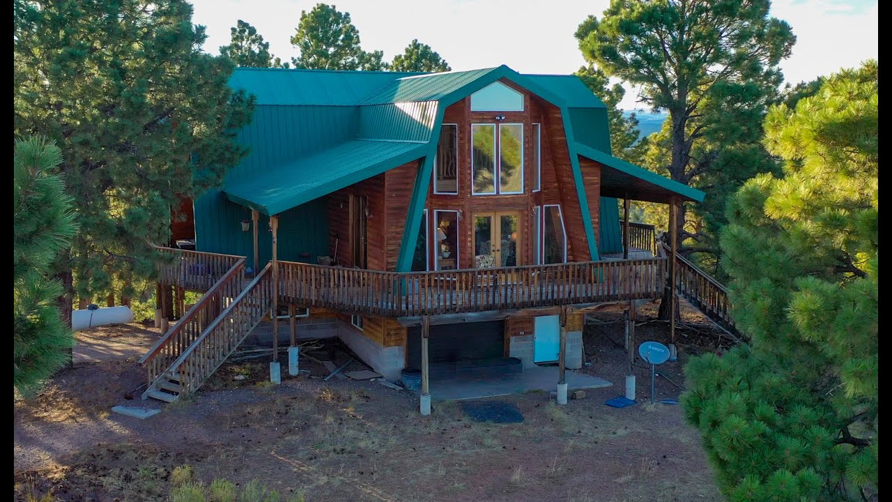 Beautiful Cabin Near Duck Creek Village with 3,000 square foot garage and 20 acres