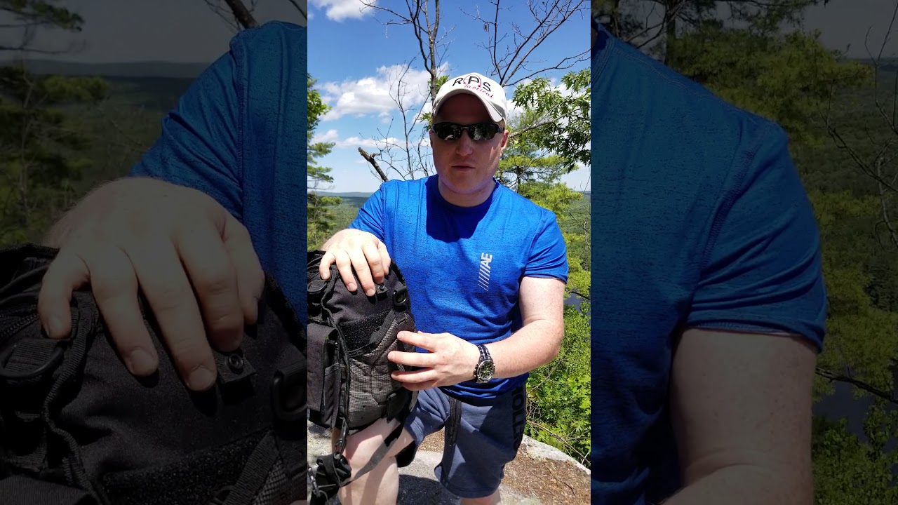 Appendix holster mounted in a backpack.