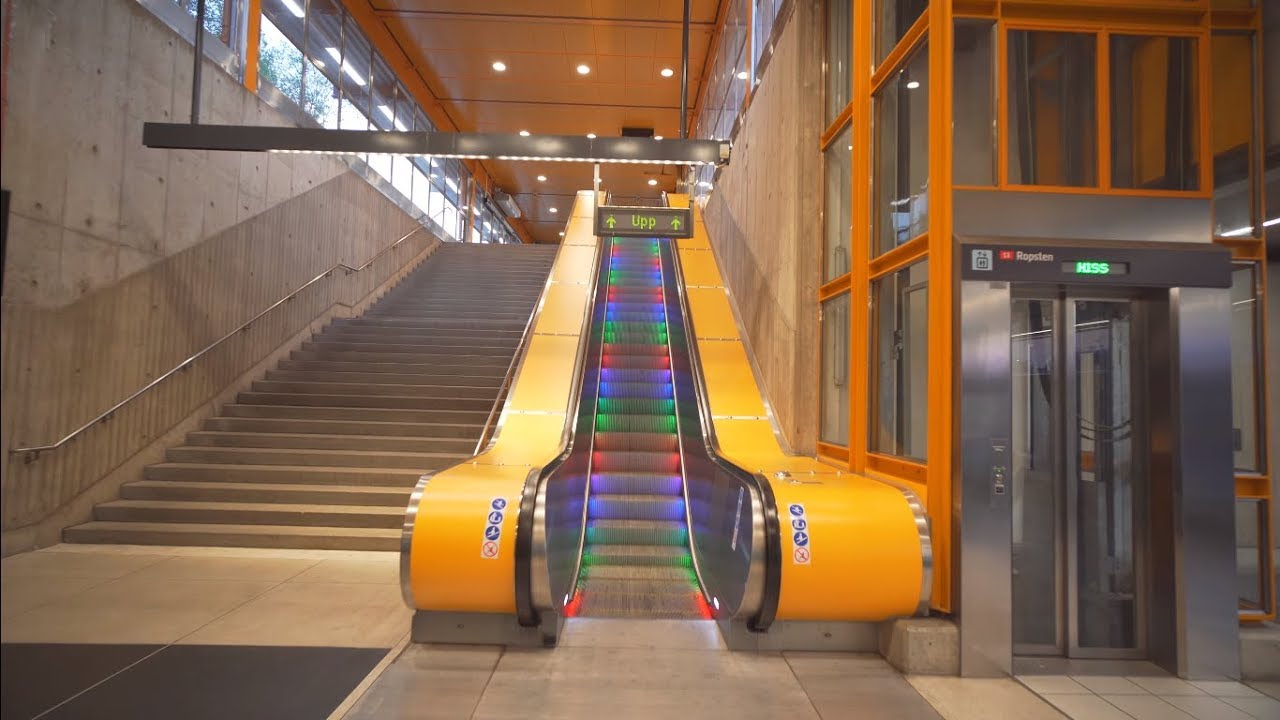 Sweden, Stockholm, Norsborg Subway Station, 2X escalator - going to platform