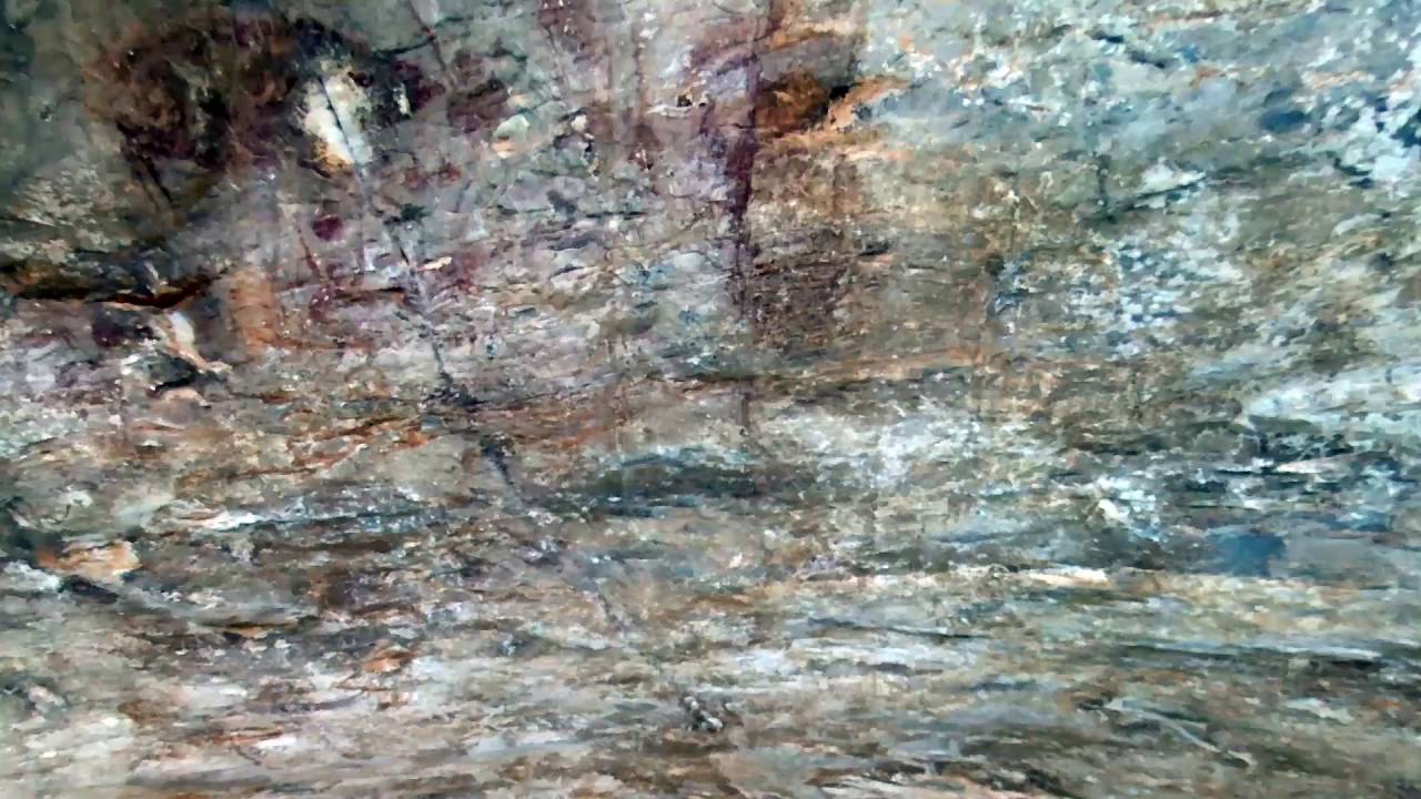 Gua Tambun - Drone video of the cliff wall and the highest rock paintings