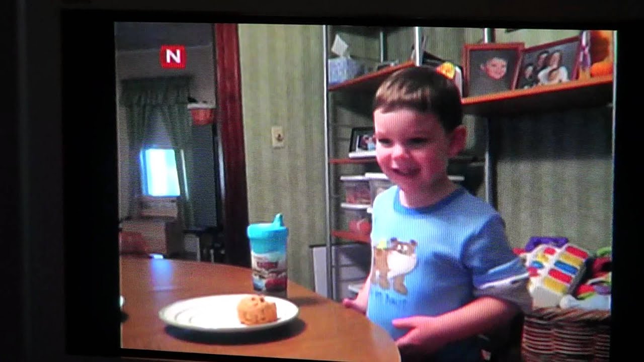 Cute little boy singing Sweet Caroline