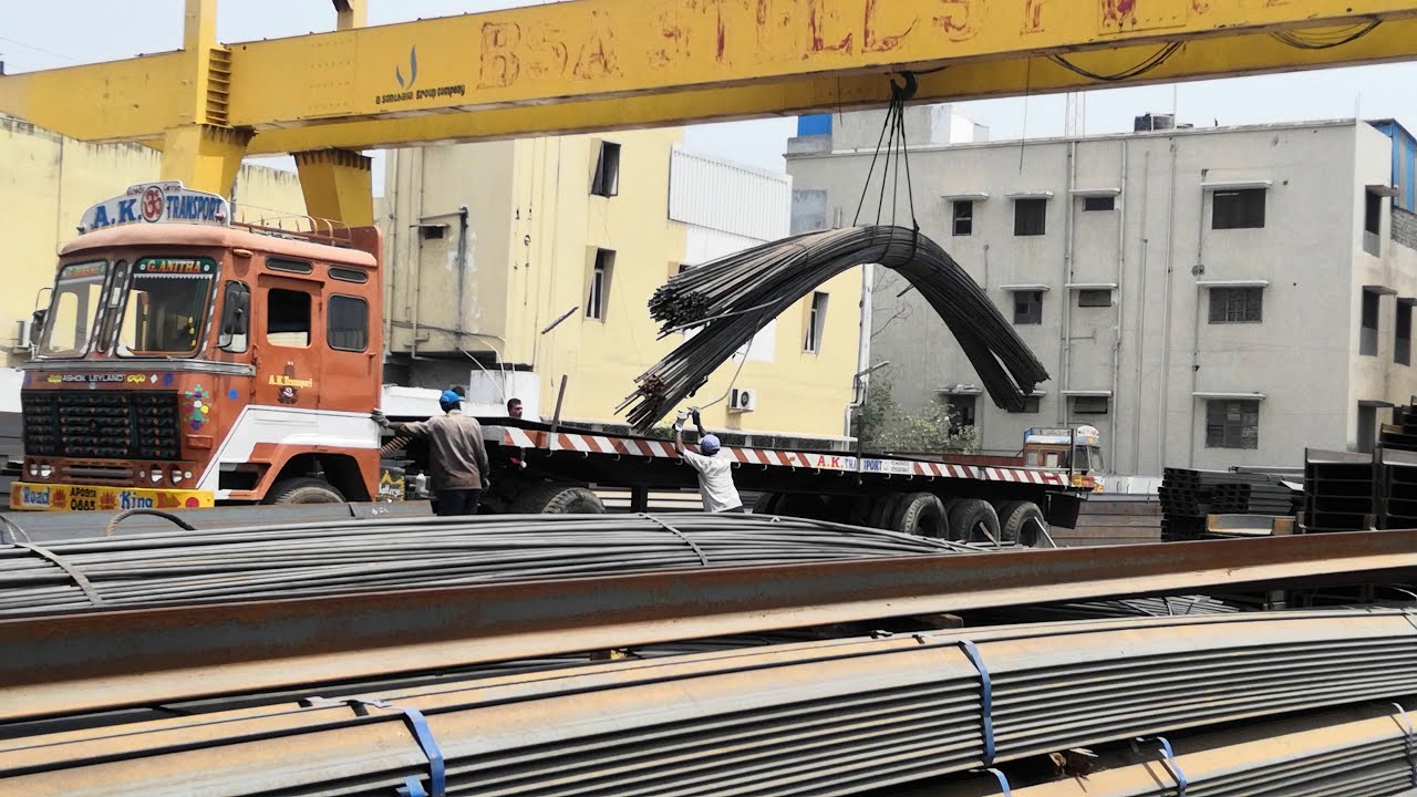 Loading steel and iron bars into the heavy truck Balanagar Hyderabad