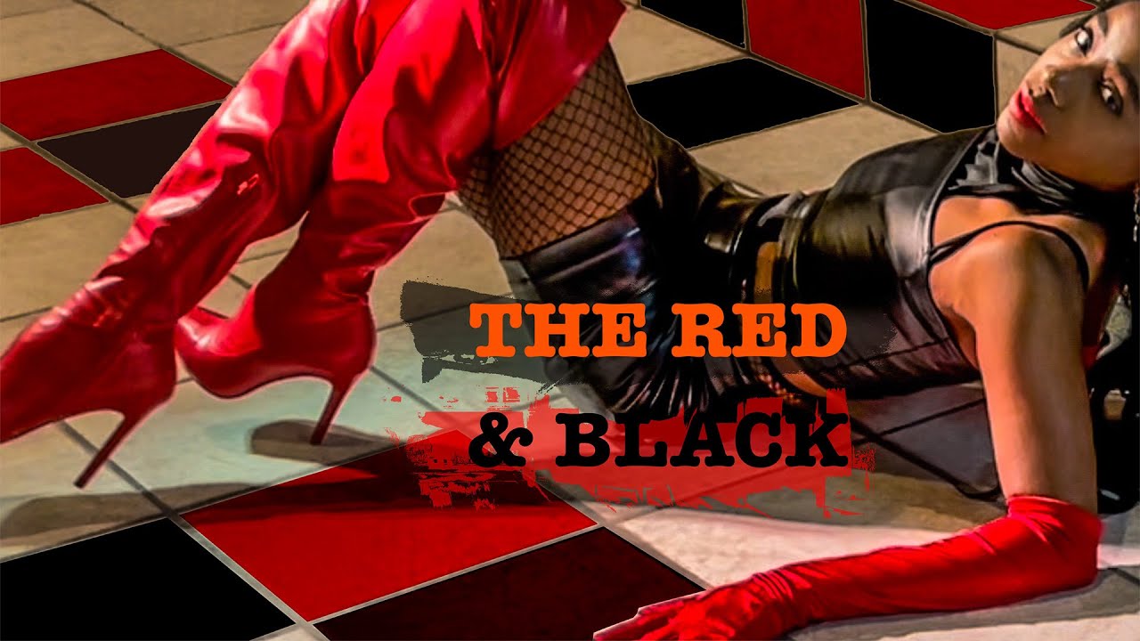 Black faux leather mini skirt and latex top styled with red thigh high boots and long red gloves