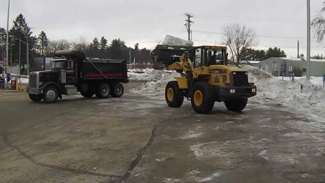 Loading Dump Truck With Snow