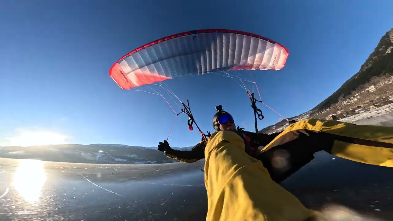 A Speedwing a Mountain & Frozen Lake.