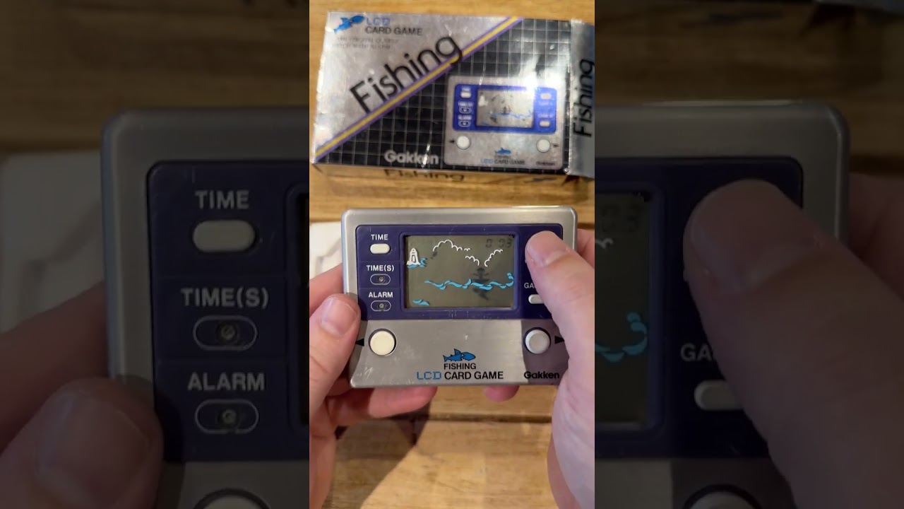 MAC 77 - Gakken Fishing 1981 LCD Metal Card Game Handheld Watch Travel Alarm Retro Fun! 🕹🎮🎣