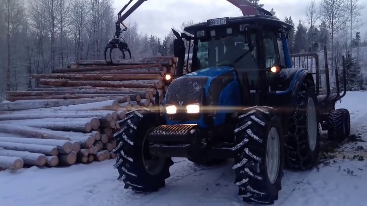 VALTRA N101 med PATU skogskran och vagn.