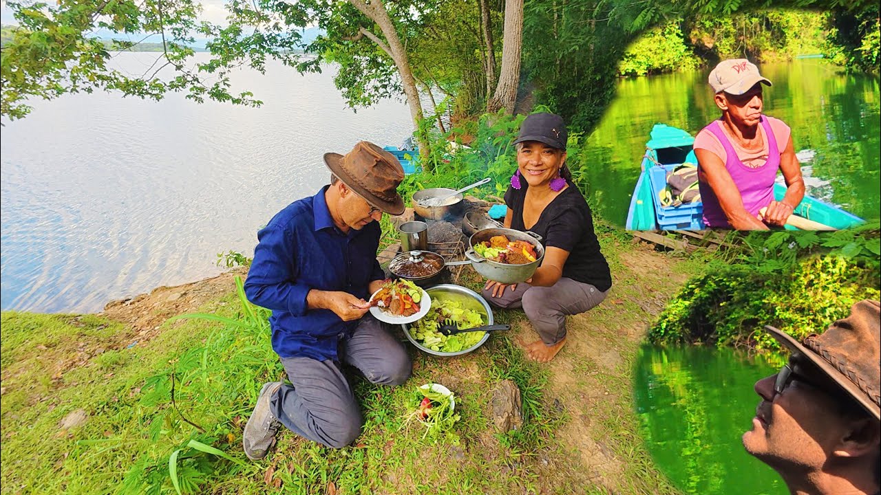 Cocinando carne pescado y arroz en el caño de Lolo presa rincón La Vega RD