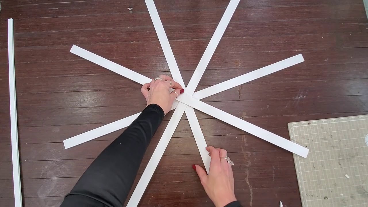 Snowflake wall art made from Readi-board foam core.