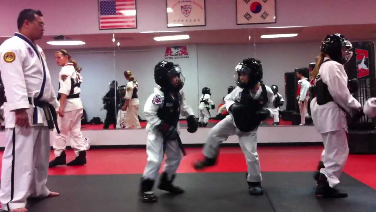 2013-03-22 ATA Irvine TaeKwonDo 6 year old Lex sparring awesome back kick and crotch kick
