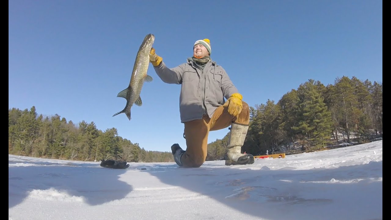 Gant Outdoors. Ice fishing action on Mirror Lake. Sauk County, Wisconsin.