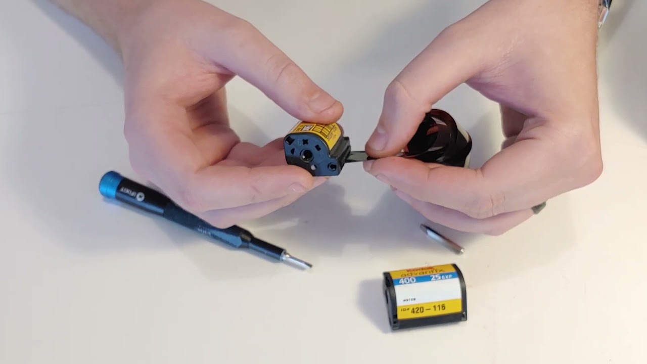 how APS film cassettes work and how to unload/reload