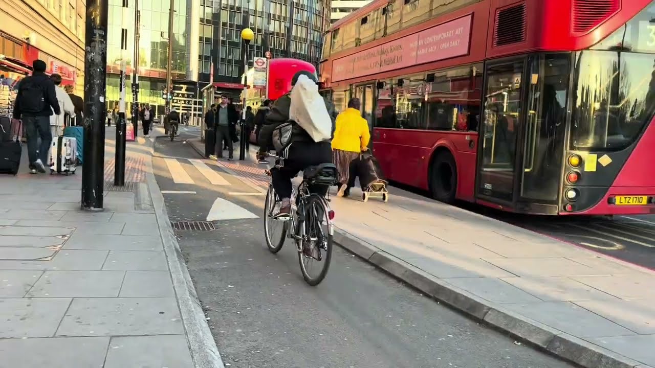 Warning 3 pedestrian cycle collisions on floating bus stop opposite St Thomas' Hospital in London.
