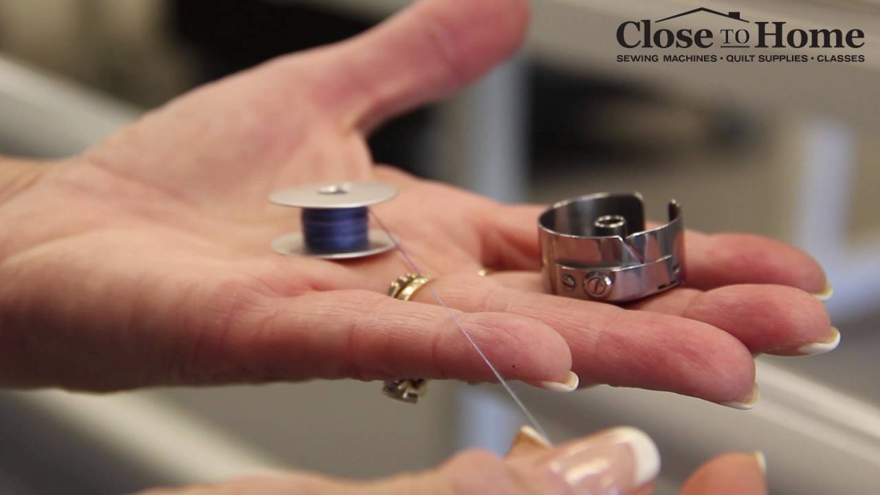 How To Insert a Bobbin Case Into the Longarm