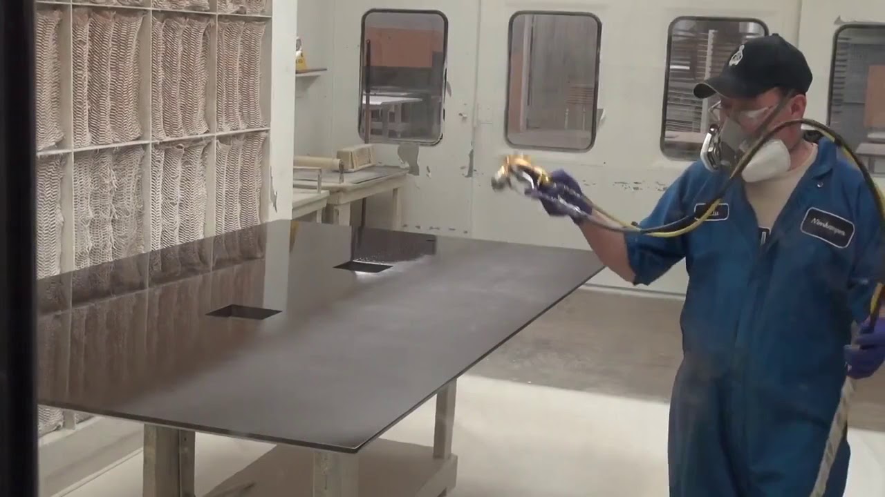 Xcite™ Airmix® Manual Spray Gun   wood table application   SAMES KREMLIN