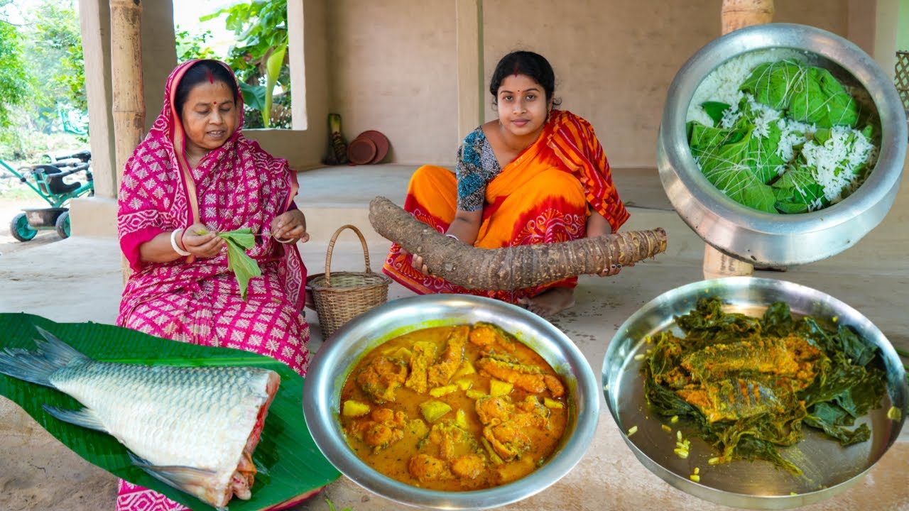 কচু দিয়ে কাতলা মাছের ঝোল তার সাথে গরম ভাতে লাউ পাতায় কৈ মাছ ভাপা |