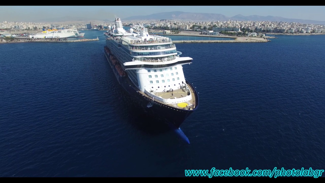 Aerial (drone) video - Mein Schiff 3 leaving Piraeus port