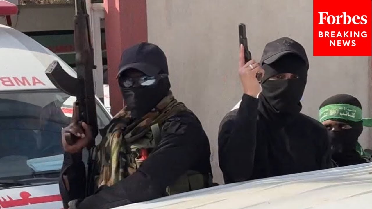 Members Of Hamas' al-Qassam Brigades Drive Through Streets Of Gaza After Ceasefire