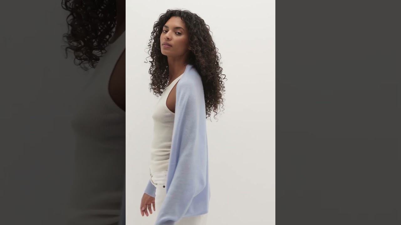 Cocoon-shape, lightweight cropped shrug. Perfect layer all year long.