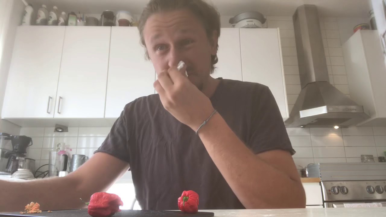 Eats Carolina reaper worlds hottest pepper with sick hiccups
