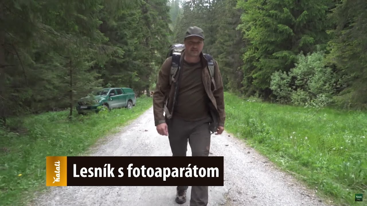 Lesník s fotoaparátom