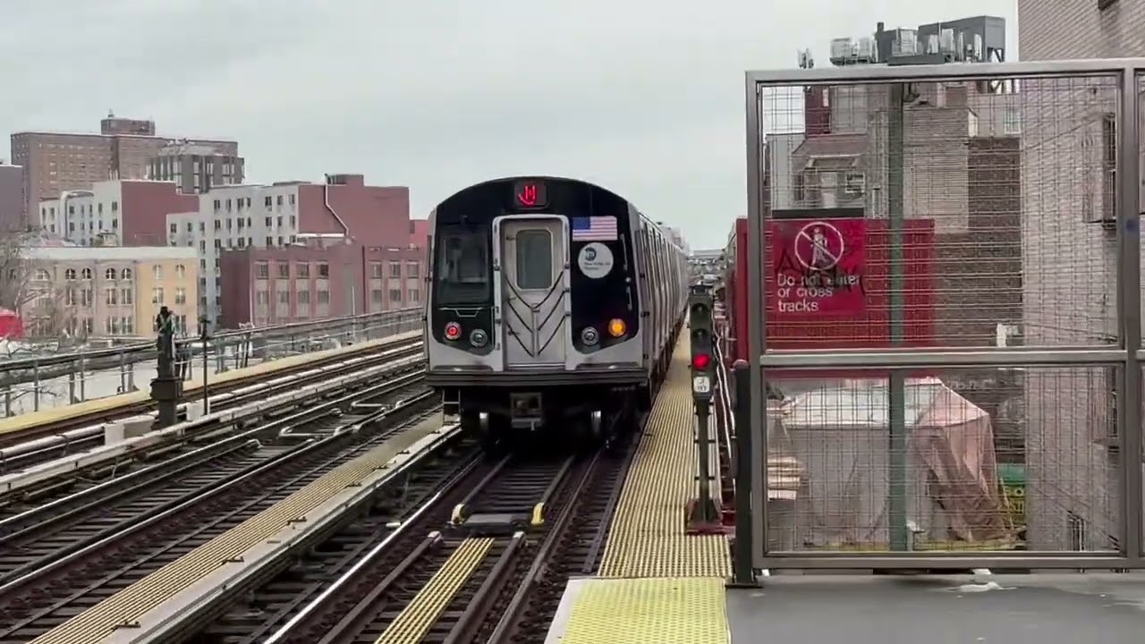 BMT NASSAU LINE: J&M local and Express action at Lorimer Street. 