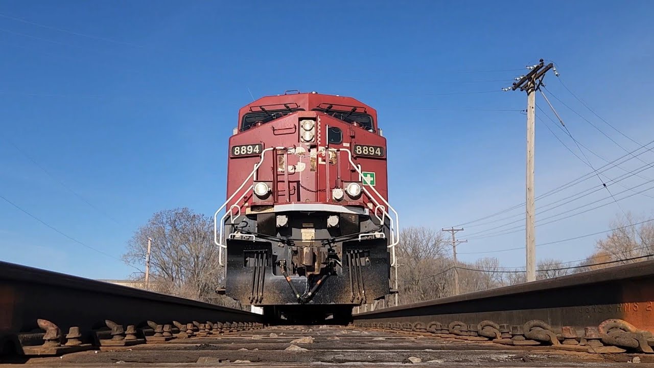 Canadian Pacific freight train going slow over camera