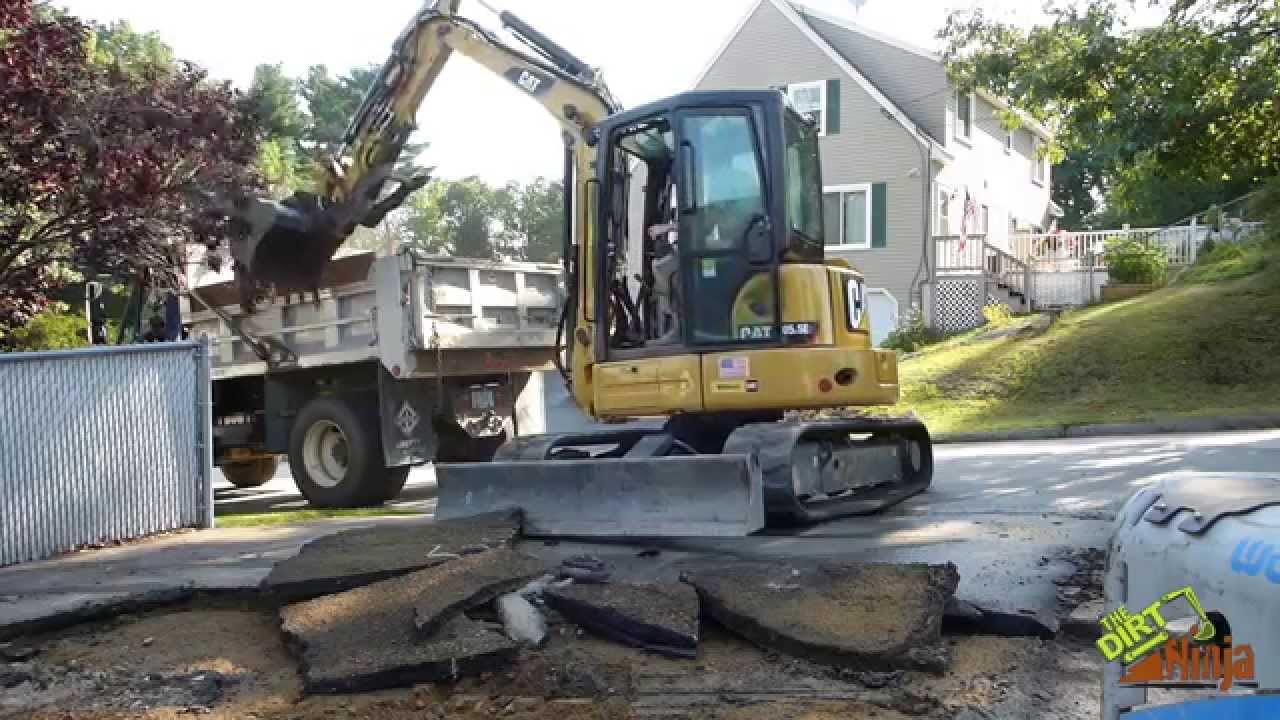 Cat 305.5e2 Loading Out Asphalt