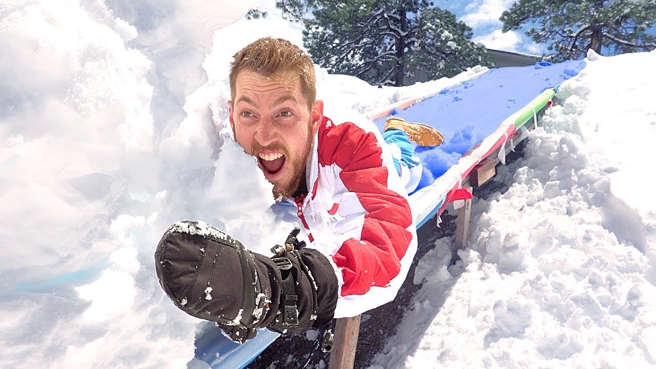 Water Slide Into A Wall Of SNOW!