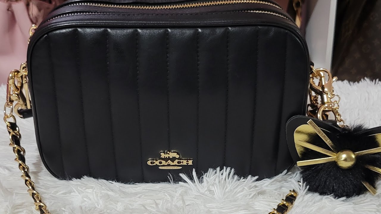 Whats In My Coach Jes🖤💛
